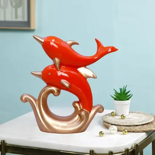 Golden Wave Dolphin Figurine – 21 cm Orange Resin Duo