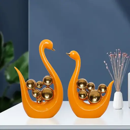 Orange Swan Figurines – Set of 2 with Golden Accents(H- 26 & 23 cm)